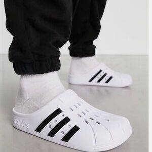 Adidas Adilette Clogs 
Brand new in box with tags 
Women’s size 9
Men’s size 8
